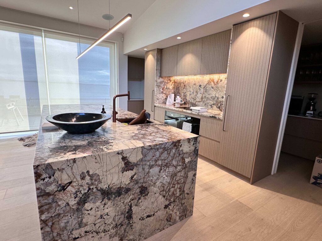 Renovated kitchen with marble island - kitchen renovation timeline Christchurch